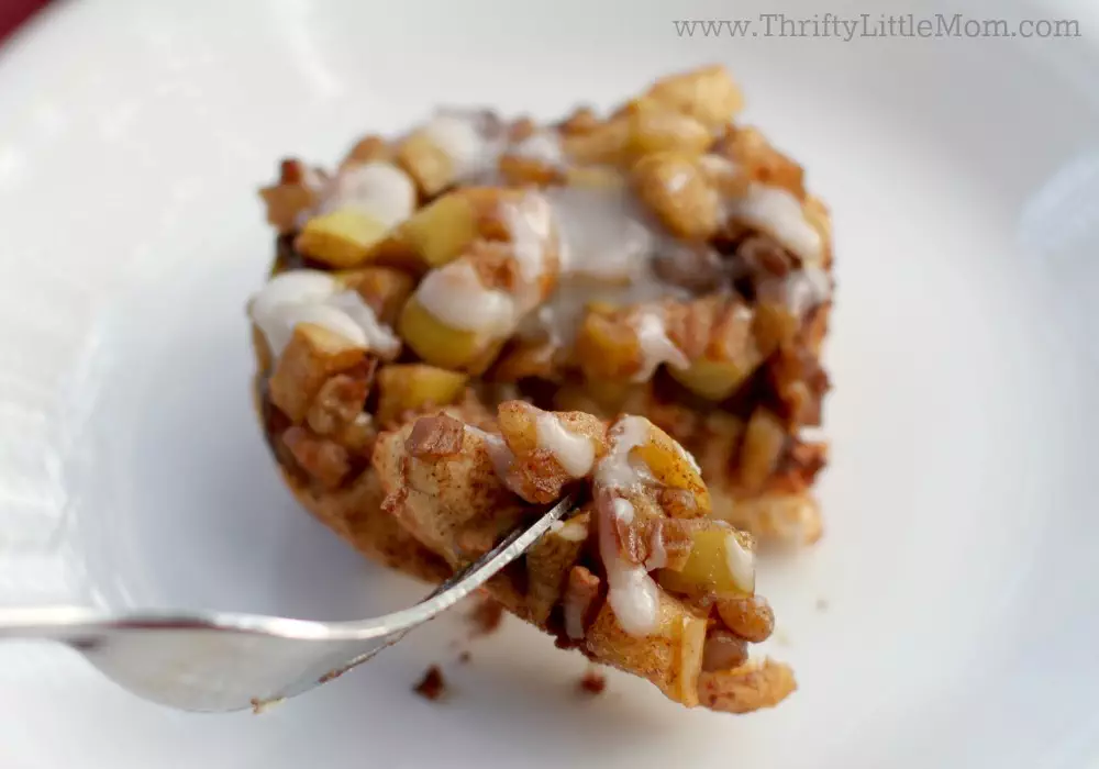 Apple Fritter Cinnamon Roll Recipe. This easy & flavor packed recipe is one that you can make with fresh or canned apples as well as Phillsbury or other refrigerated cinnamon bun dough.