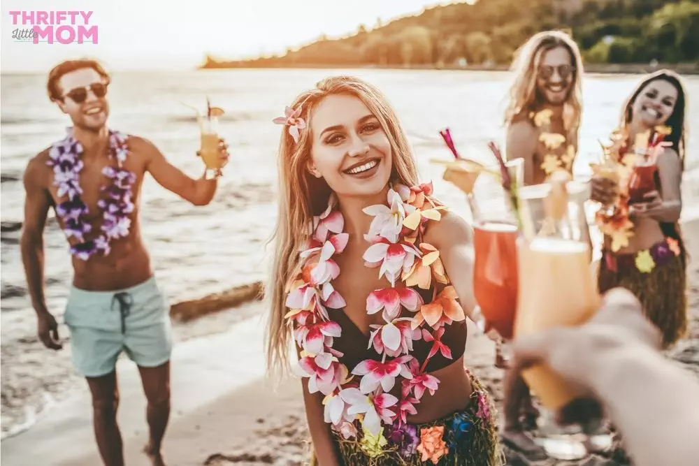 for luau party ideas, have friends gather on the beach